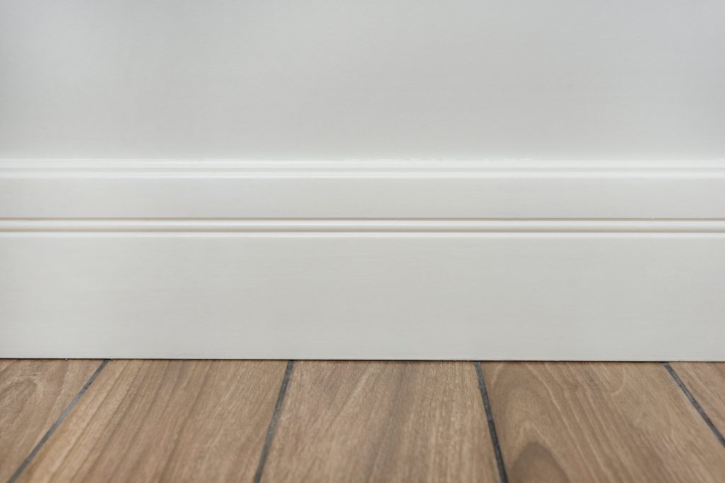 Low profile skirting board heating panel
