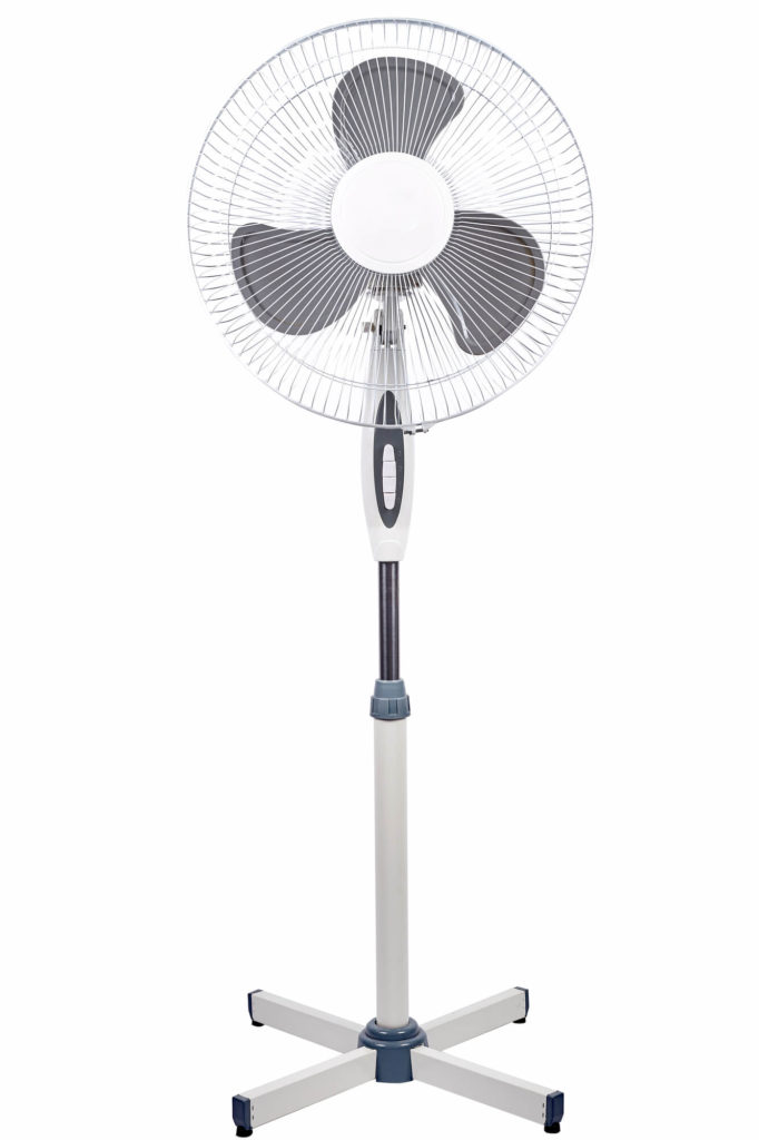Pedestal fan assembled and ready for home cooling