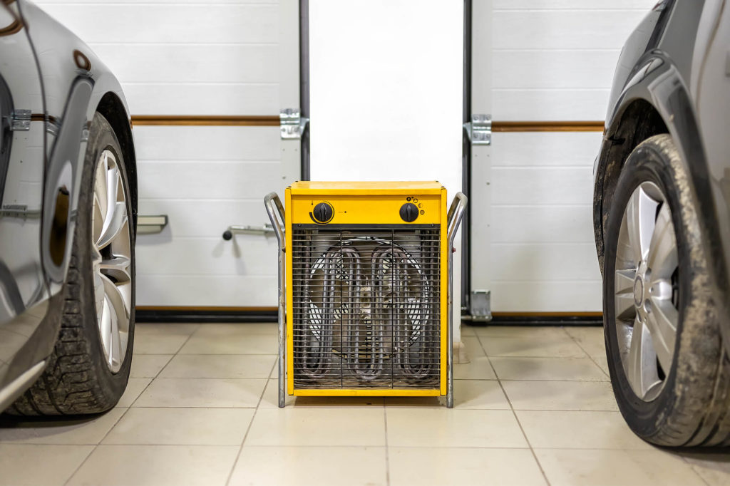 Garage heater used to warm a workshop space