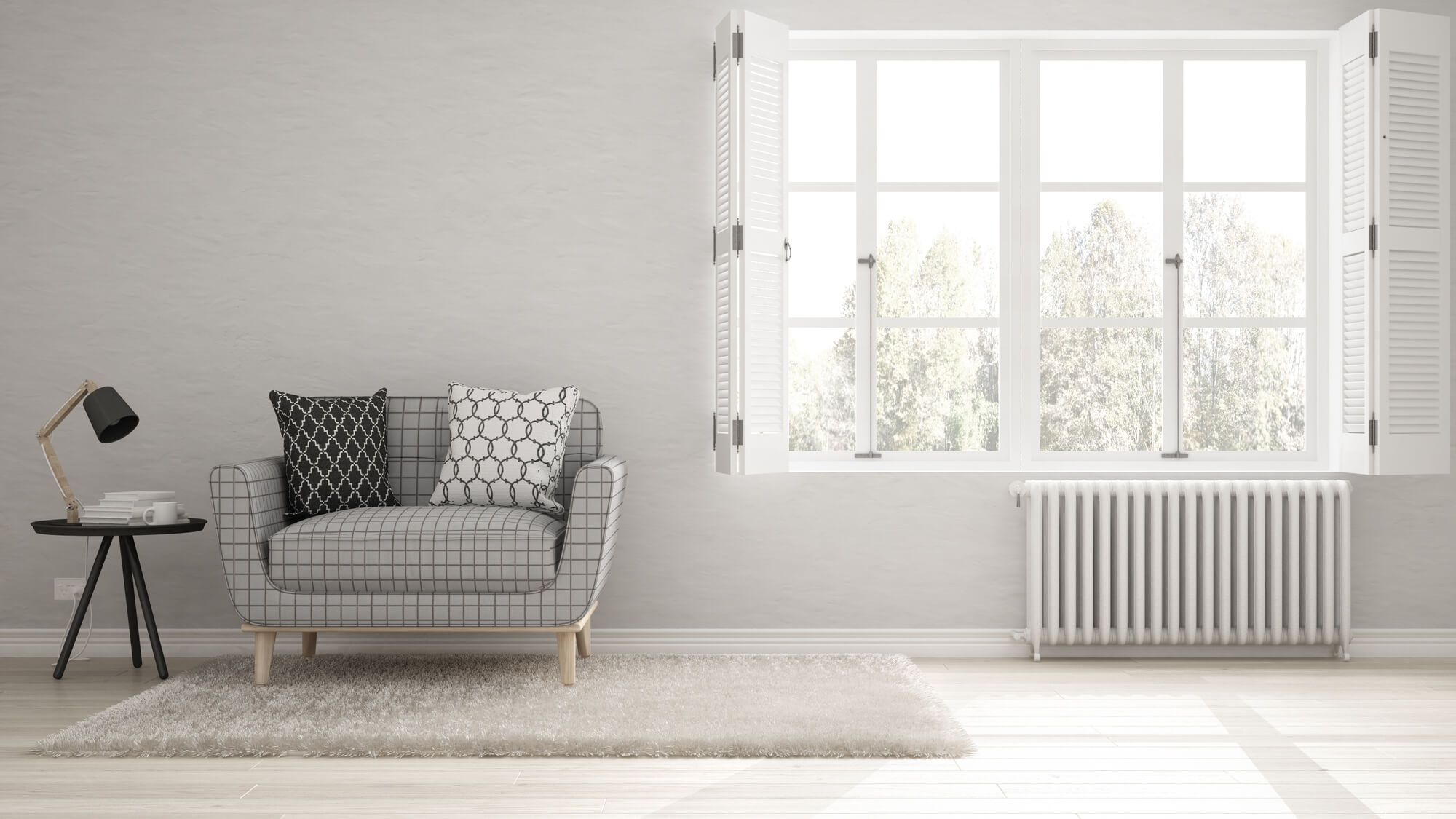 Horizontal radiator in a living room sized for room heat loss
